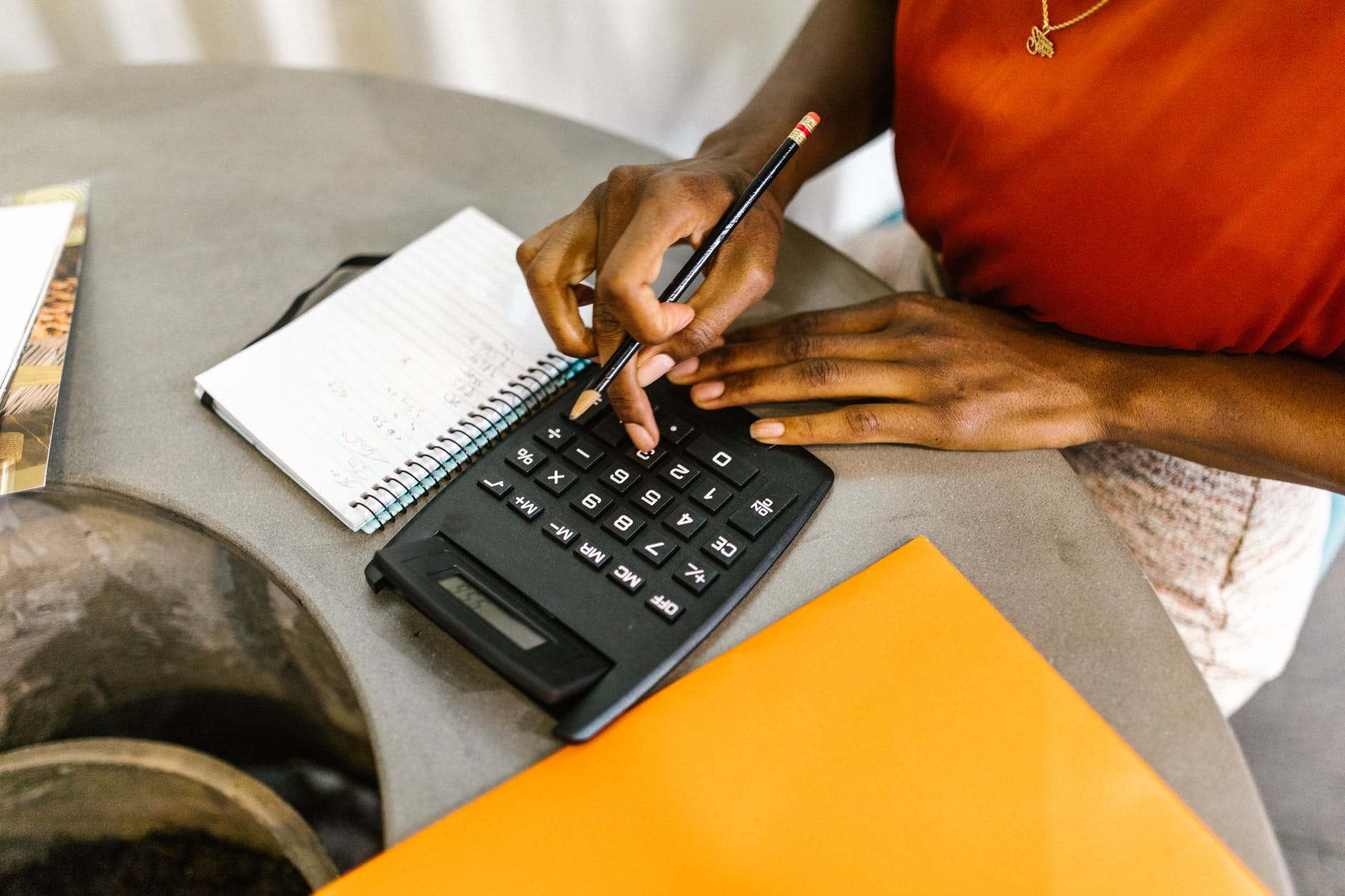 woman uses calculator
business advice
financial planning tips